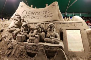 Holiday Bill of Rights Post image of Santa's elves sand sculpture.