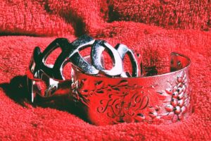 This is the opening image for What is The Shiny Object Syndrome? A pair of shiny silver cuffs.